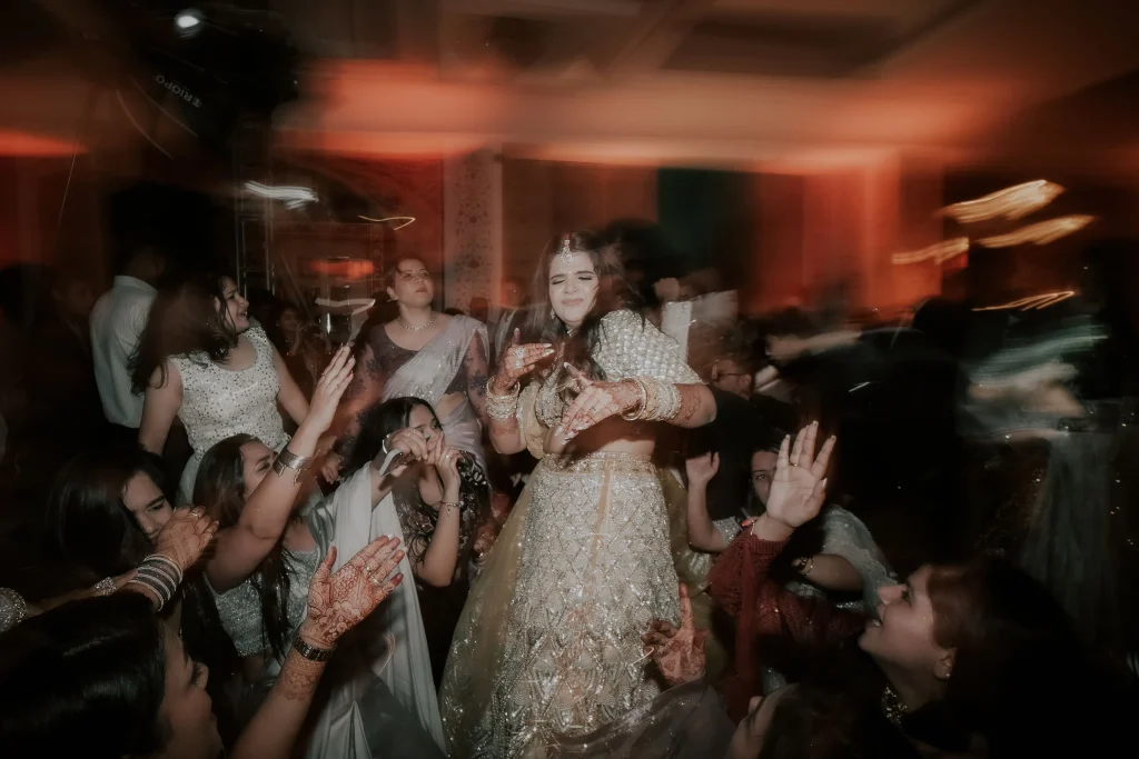 bride enjoying dance at cocktail party - candid wedding photography